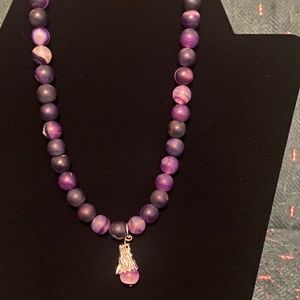 Amethyst the chocker with a dragon pendant
